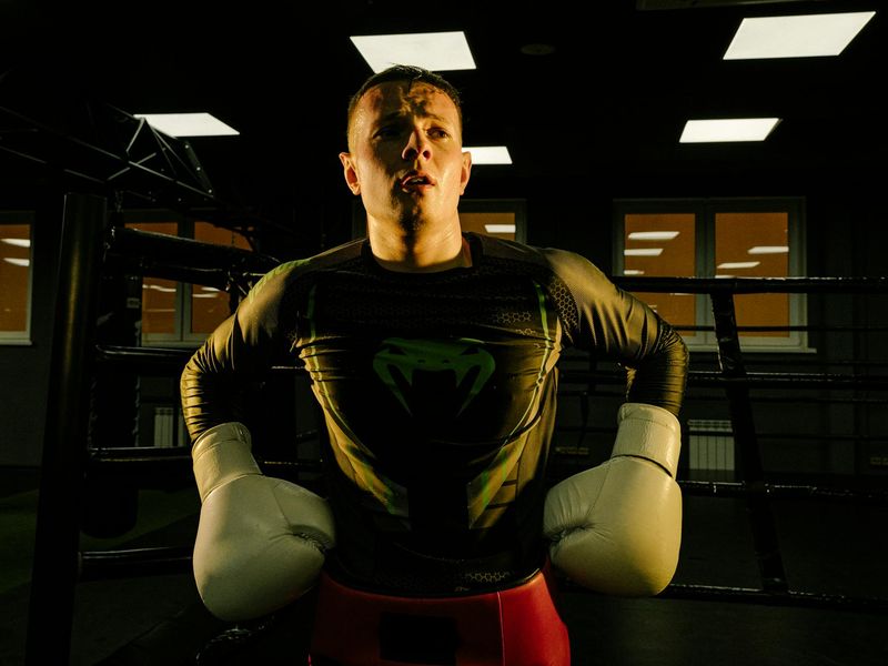 Close-up on a person's focused expression during a calm exercise.